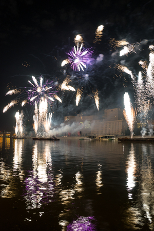 Russia. Moscow - September 26, 2015. The opening of the festival Circle Of Light 2015. Gorkiy Park. View of the complex of buildings of the Ministry of Defense during the show. Salute. Fireworks.のeditorial素材