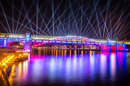 Russia. Moscow - September 26, 2015. The opening of the Festival Circle Of Light. Gorkiy Park. The Andreevskiy Bridge during the Show.のeditorial素材