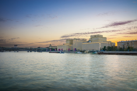 Russia. Moscow - September 26, 2015. The opening of the festival Circle Of Light 2015. Gorky Park. View of the complex of buildings of the Ministry of Defense and Andreevskiy Bridge during the show.のeditorial素材
