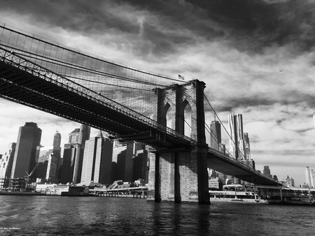 South Manhattan, From East River under Brooklyn Bridgeの写真素材