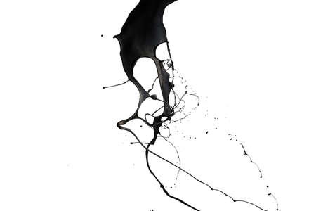 Black paint splash isolated on white background.の写真素材