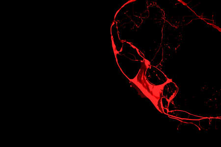 Red paint splash isolated on black background.