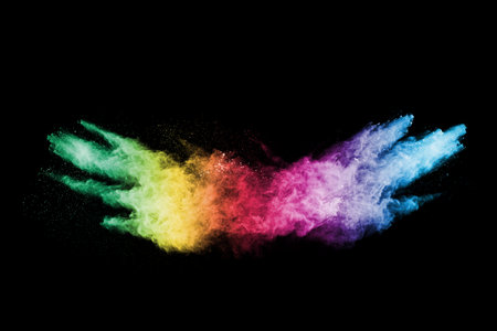 abstract colored dust explosion on a black background.abstract powder splatted background,Freeze motion of color powder exploding/throwing color powder, multicolored glitter texture.の写真素材