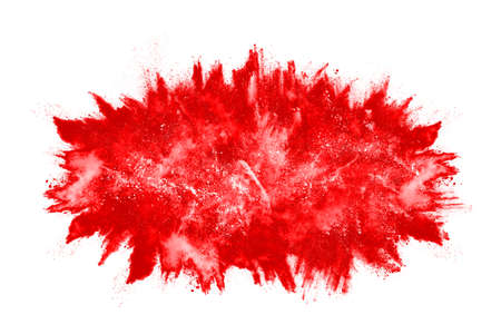 Freeze motion of red powder exploding, isolated on white background. Abstract design of red dust...