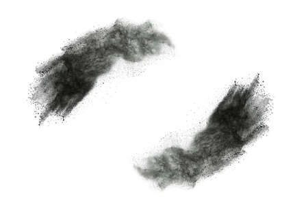 particles of charcoal on white background,abstract powder splatted on white background,Freeze motion...