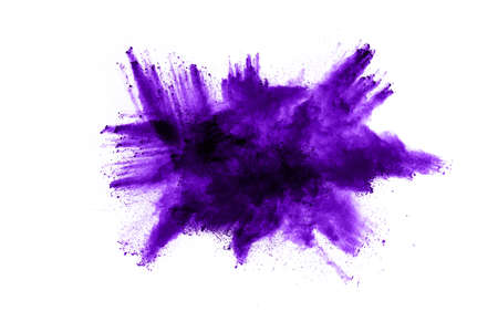 Powder explosion. Closeup of a purple dust particle explosion isolated on white. Abstract background.の写真素材