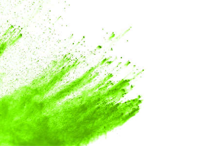 Green powder explosion on white background. Colored cloud. Colorful dust explode. Paint Holi.