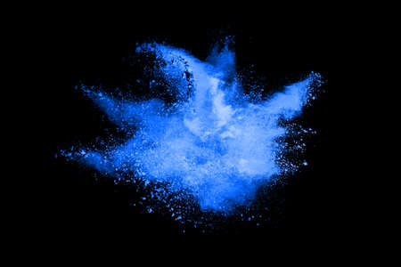 abstract blue powder splatted background,Freeze motion of color powder exploding/throwing color...