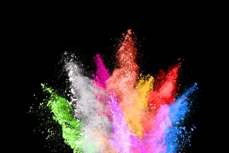 abstract colored dust explosion on a black background.abstract powder splatted background,Freeze...