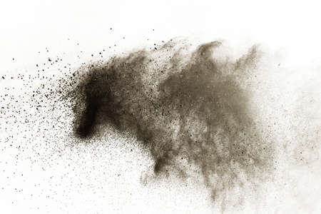particles of charcoal on white background,abstract powder splatted on white background,Freeze motion of black powder exploding or throwing black powder.の写真素材