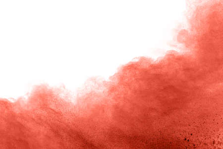living coral color powder explosion on white background. Colored cloud. Colorful dust explode. Paint Holi.の写真素材