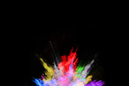 abstract colored dust explosion on a black background.abstract powder splatted background,Freeze motion of color powder exploding/throwing color powder, multicolored glitter texture.の写真素材