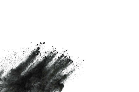 Particles of charcoal on white background,abstract powder splatted on white background,Freeze motion of black powder exploding or throwing black powder.の写真素材