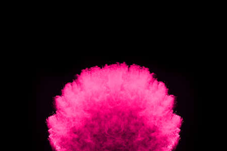 Particles of charcoal on white background,abstract powder splatted on white background,Freeze motion...