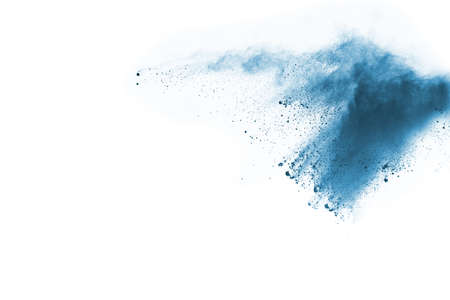 Blue color powder explosion on white background. Colored cloud. Colorful dust explode. Paint Holi.の写真素材
