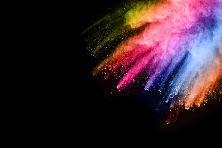 abstract colored dust explosion on a black background.abstract powder splatted background,Freeze...