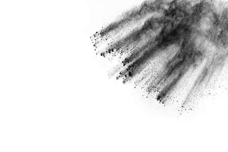particles of charcoal on white background,abstract powder splatted on white background,Freeze motion of black powder exploding or throwing black powder.の写真素材