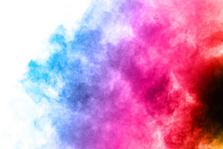 abstract powder splatted background. Colorful powder explosion on white background. Colored cloud....
