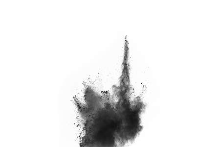 particles of charcoal on white background,abstract powder splatted on white background,Freeze motion of black powder exploding or throwing black powder.の写真素材