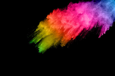 abstract colored dust explosion on a black background.abstract powder splatted background,Freeze...