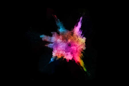 abstract colored dust explosion on a black background.abstract powder splatted background,Freeze...