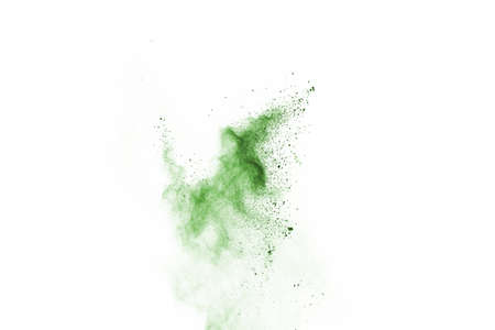 Green powder explosion on white background. Colored cloud. Colorful dust explode. Paint Holiの写真素材