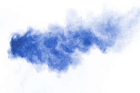 Blue color powder explosion on white background. Colored cloud. Colorful dust explode. Paint Holi.