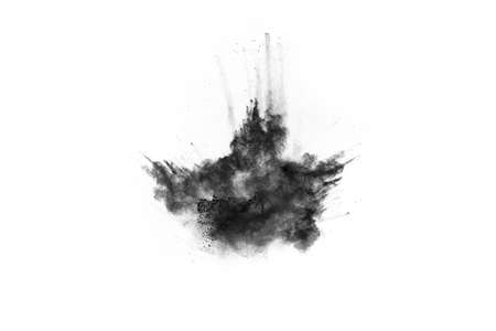 particles of charcoal on white background,abstract powder splatted on white background,Freeze motion of black powder exploding or throwing black powder.の写真素材