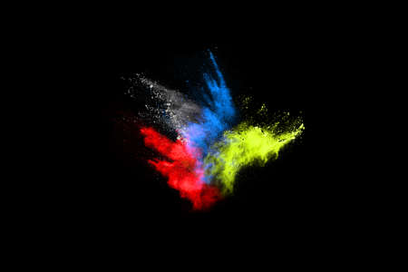 abstract colored dust explosion on a black background.abstract powder splatted background,Freeze...