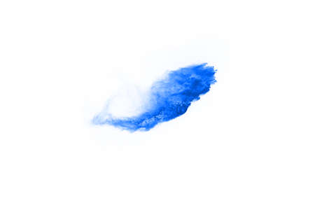 Blue color powder explosion on white background. Colored cloud. Colorful dust explode. Paint Holi.の写真素材