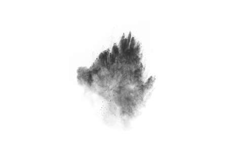 particles of charcoal on white background,abstract powder splatted on white background,Freeze motion of black powder exploding or throwing black powder.の写真素材