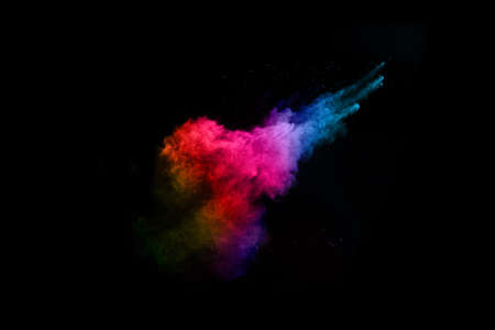 abstract colored dust explosion on a black background.abstract powder splatted background,Freeze...