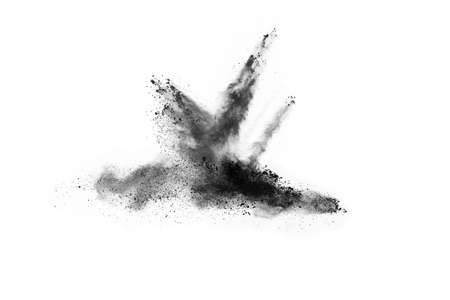 particles of charcoal on white background,abstract powder splatted on white background,Freeze motion...