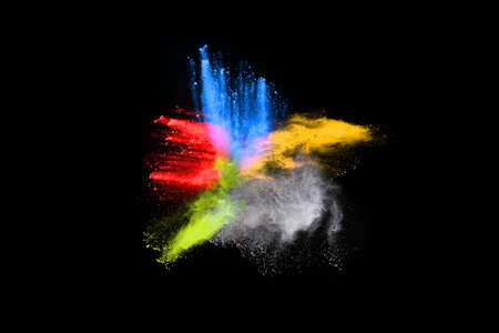 abstract colored dust explosion on a black background.abstract powder splatted background,Freeze...
