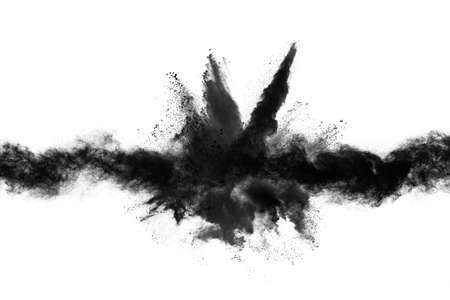particles of charcoal on white background,abstract powder splatted on white background,Freeze motion of black powder exploding or throwing black powder.の写真素材