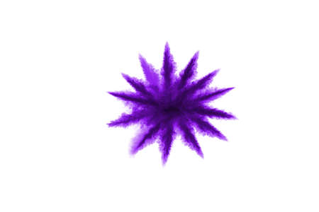 Powder explosion. Closeup of a purple dust particle explosion isolated on white. Abstract background.の写真素材