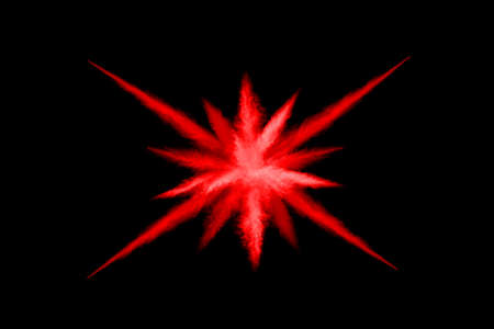 abstract red powder explosion on black background.abstract red powder splatted on black background. Freeze motion of red powder exploding.の写真素材