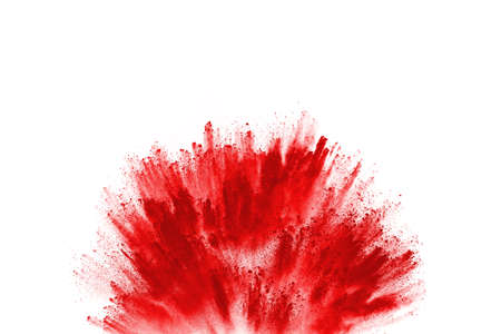 Freeze motion of red powder exploding, isolated on white background. Abstract design of red dust cloud. Particles explosion screen saver, wallpaperの写真素材