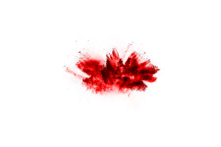 Freeze motion of red powder exploding, isolated on white background. Abstract design of red dust cloud. Particles explosion screen saver, wallpaperの写真素材