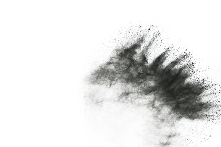 abstract colored dust explosion on a black background.の写真素材