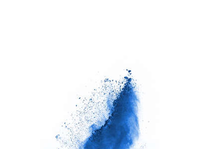 Blue color powder explosion on white background. Colored cloud. Colorful dust explode. Paint Holi.の写真素材
