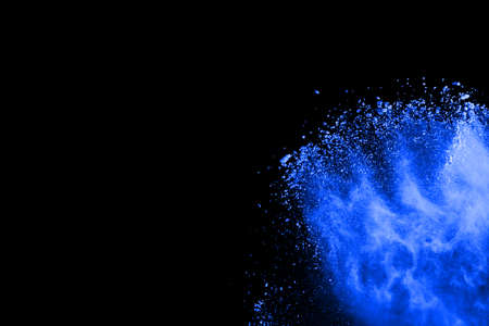 abstract blue powder splatted background,Freeze motion of color powder exploding/throwing color...