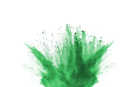 abstract powder splatted background,Freeze motion of green powder exploding,throwing orange dust on...