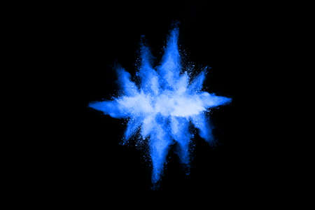 abstract blue powder splatted background,Freeze motion of color powder exploding/throwing color powder,color glitter texture on black background.の写真素材
