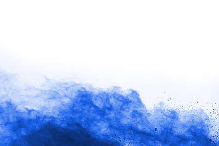 Blue color powder explosion on white background. Colored cloud. Colorful dust explode. Paint Holi.