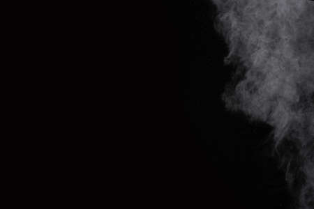 White powder explosion on black background. Colored cloud. Colorful dust explode. Paint Holi.