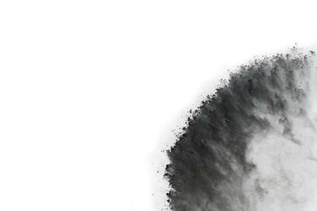 abstract colored dust explosion on a black background.の写真素材