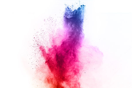 Abstract powder splatted background. Colorful powder explosion on white background. Colored cloud. Colorful dust explode. Paint Holi.の写真素材