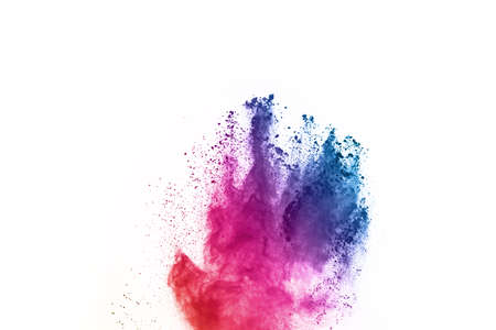 Abstract powder splatted background. Colorful powder explosion on white background. Colored cloud. Colorful dust explode. Paint Holi.の写真素材