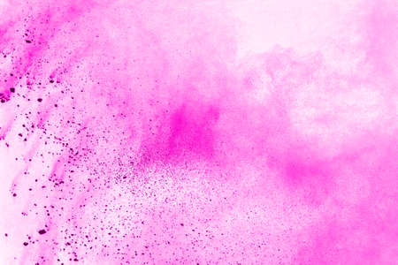 Abstract pink powder splatted background,Freeze motion of color powder exploding/throwing color...